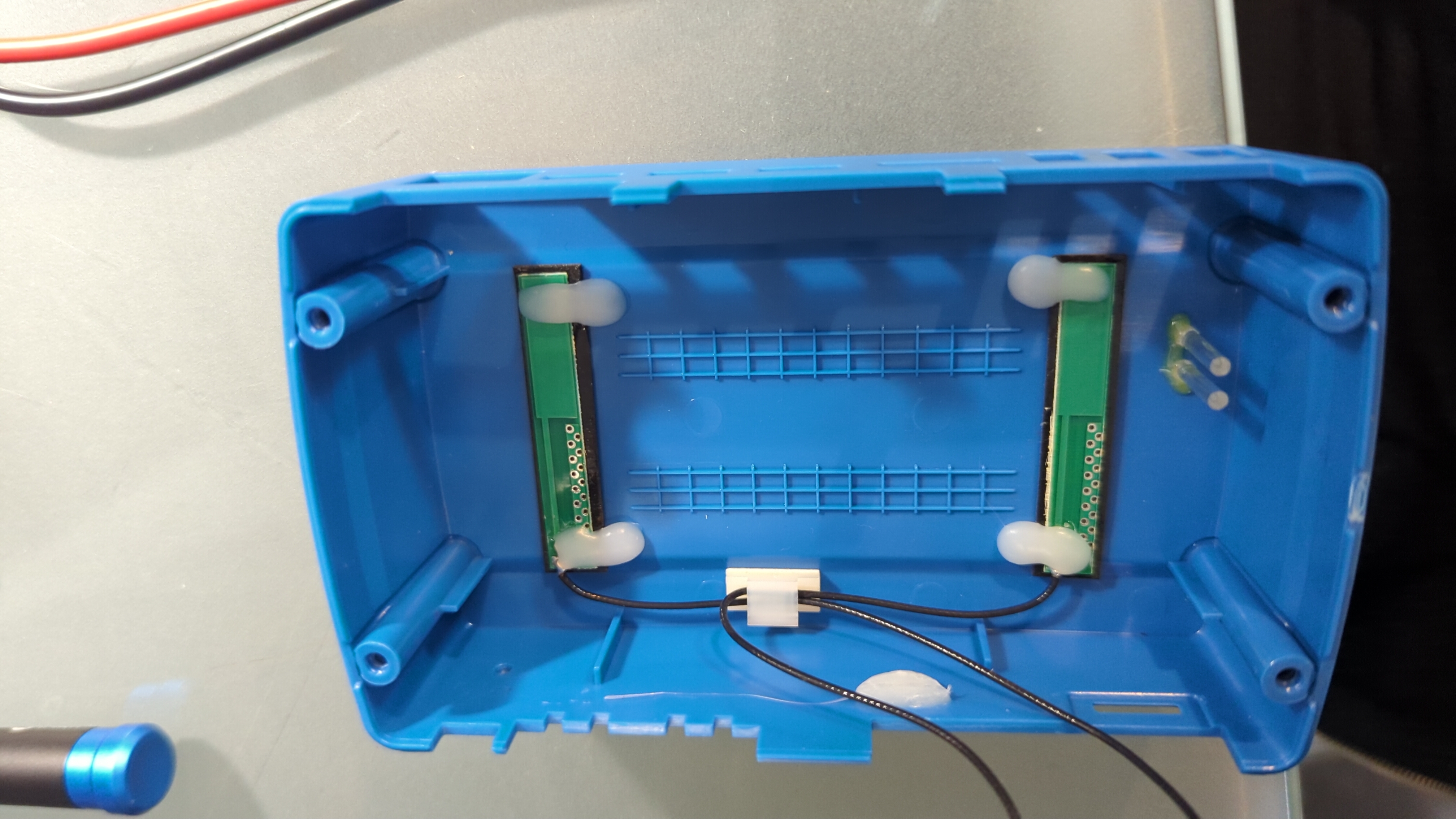 The bluetooth and wireless antennas in the back of the plastic cover.